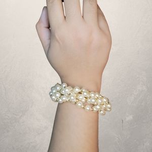 Faux pearl and gold bracelet